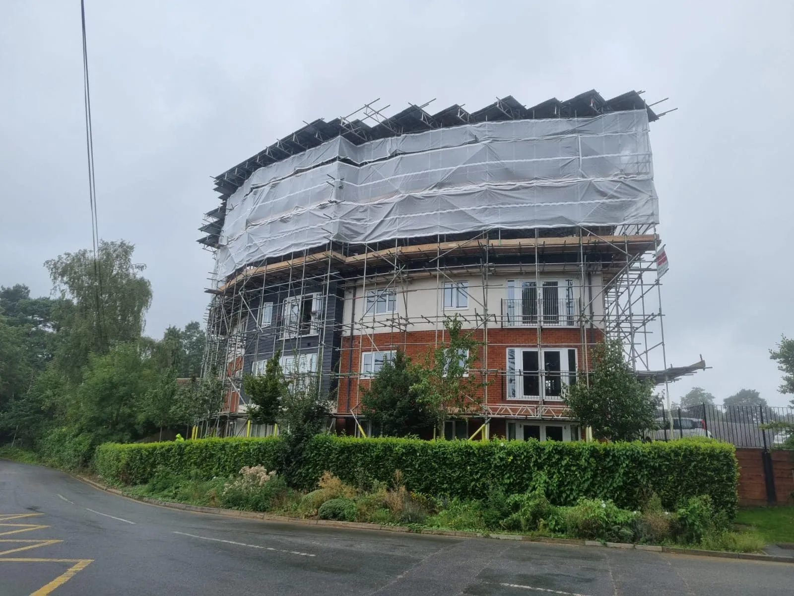 A large building with scaffolding on top of it.